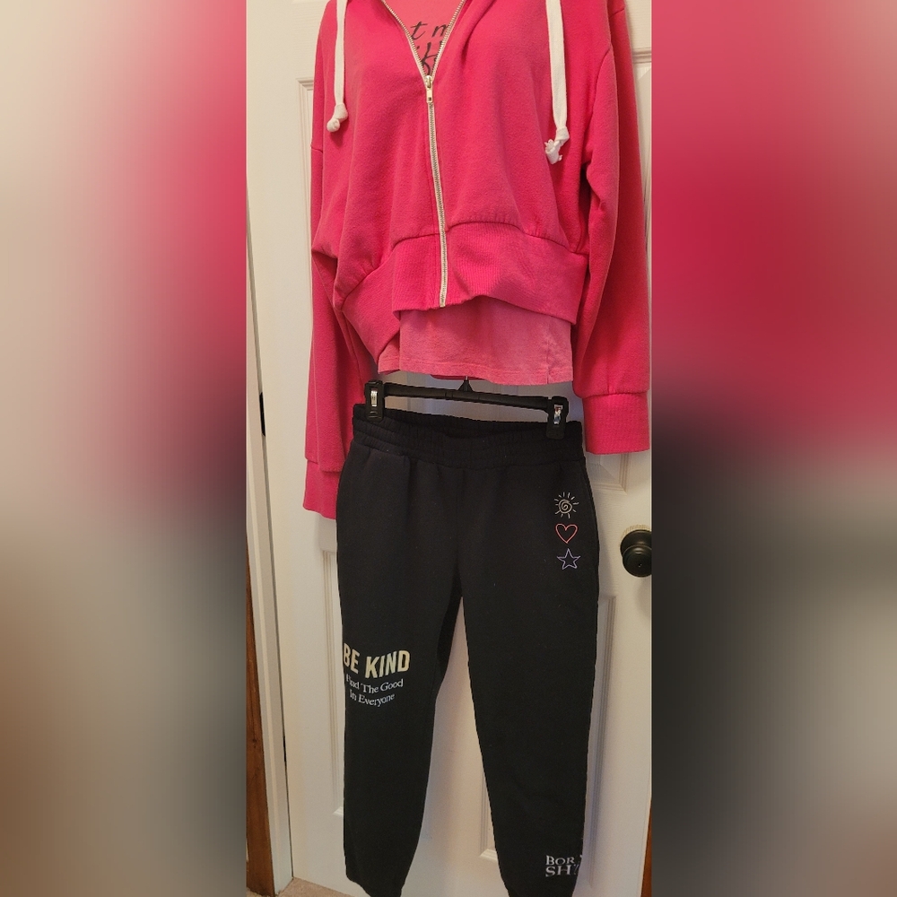 Pink Hoodie and Black Sweatpants.
